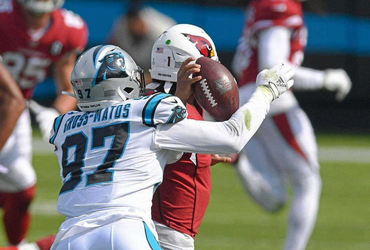 Carolina Panthers defensive end Yetur Gross-Matos (97) cause a fumble as Arizona Cardinals quarterback Kyler Murray (1) tries to pass downfield during the second half at Bank of America Stadium in Charlotte, NC on Sunday, October 4, 2020. The Panthers recovered and went on to win, 31-21