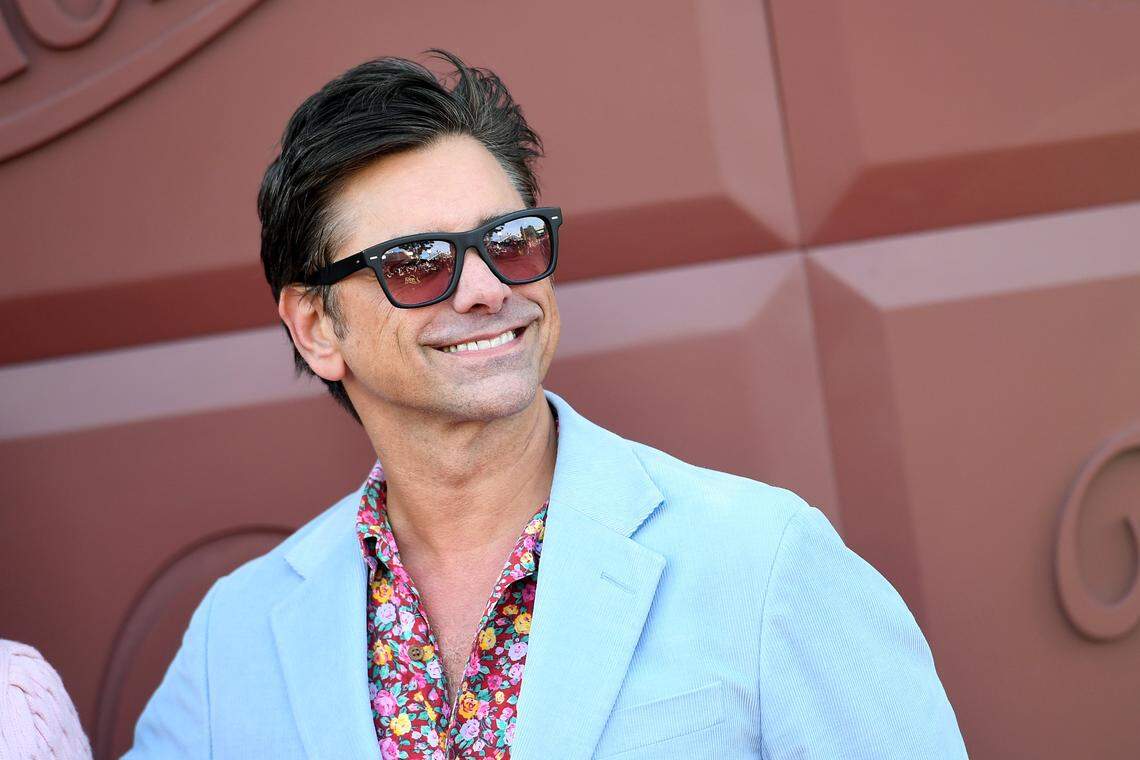 LOS ANGELES, CALIFORNIA - DECEMBER 10: John Stamos attends Los Angeles Premiere of Warner Bros. "Wonka" at Regency Village Theatre on December 10, 2023 in Los Angeles, California. (Photo by JC Olivera/Getty Images)