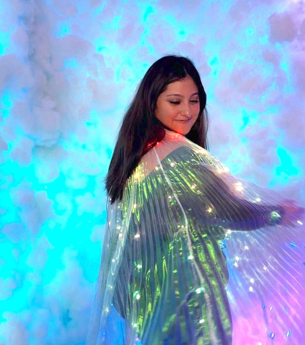 Portal CLT has several installations and rooms that were designed by local artists, including this one where CharlotteFive’s Denise Casalez is posing.