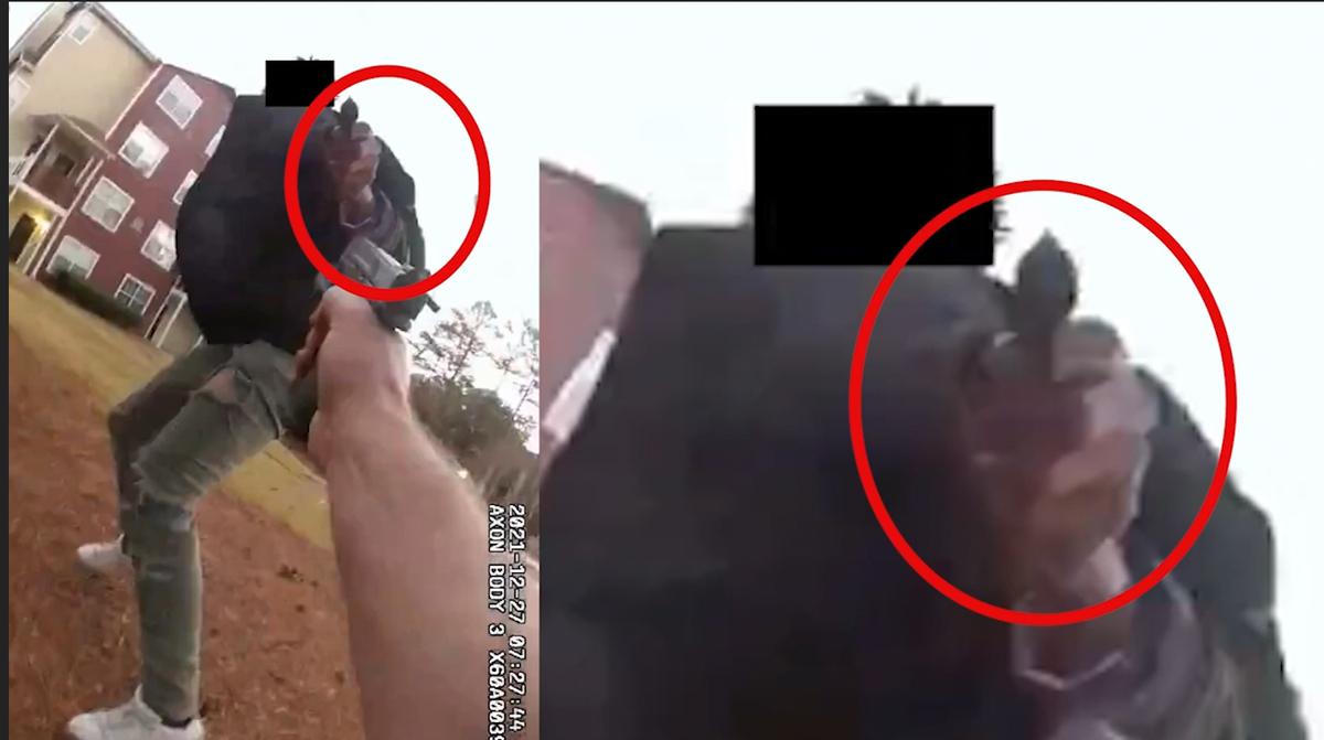 This image from Charlotte-Mecklenburg police Officer Elliott Whitley’s body-worn camera shows him preparing to fire his weapon at a juvenile suspect who had just shot him runs away on Dec. 27, 2021.