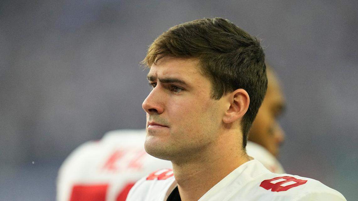 New York Giants quarterback Daniel Jones (8) stands on the field before an NFL wildcard playoff game against the Minnesota Vikings, Sunday, Jan. 15, 2023, in Minneapolis. Jones grew up in Charlotte and played quarterback for Charlotte Latin in high school and Duke in college.