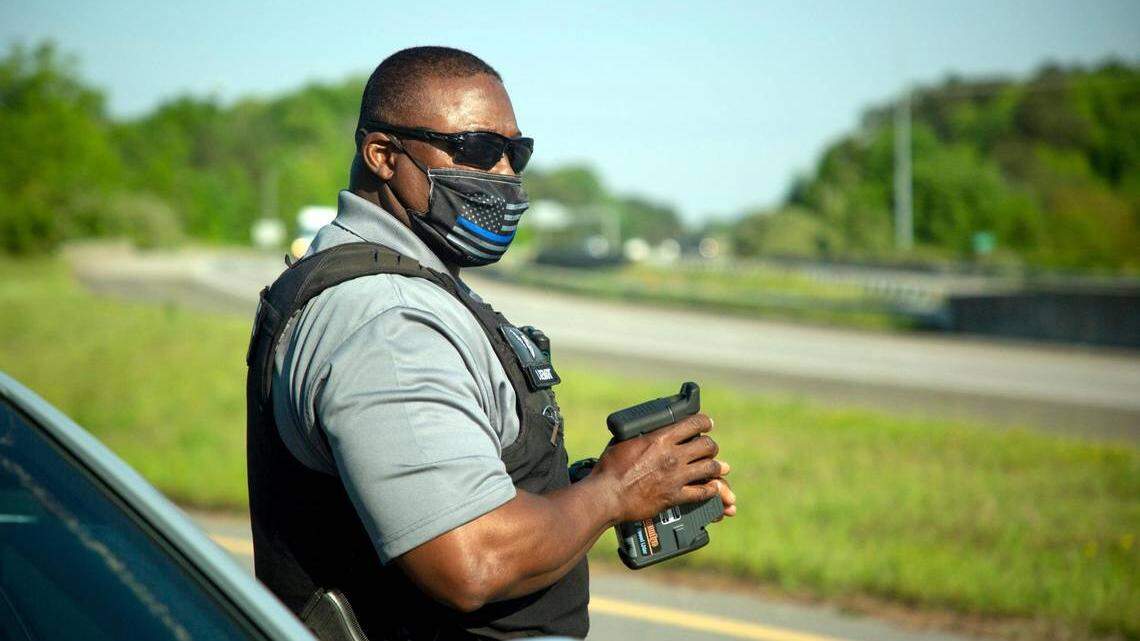 In this 2021 photo, Durham County Sheriff’s Deputy V. Stewart is shown watching for speeding cars on I-85.