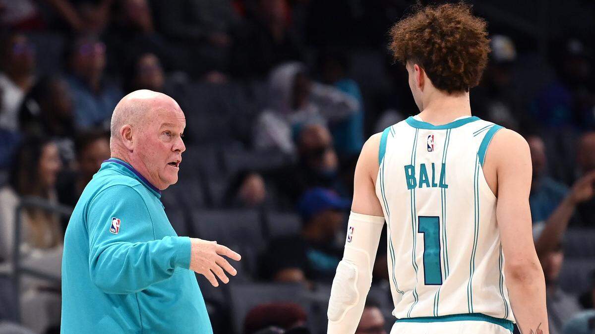 Charlotte Hornets head coach Steve Clifford, left, speaks with guard LaMelo Ball, right, during first half action against the Washington Wizards on Monday, October 10, 2022 at Spectrum Center in Charlotte, NC. The Hornets hosted the Washington Wizards in NBA preseason action.