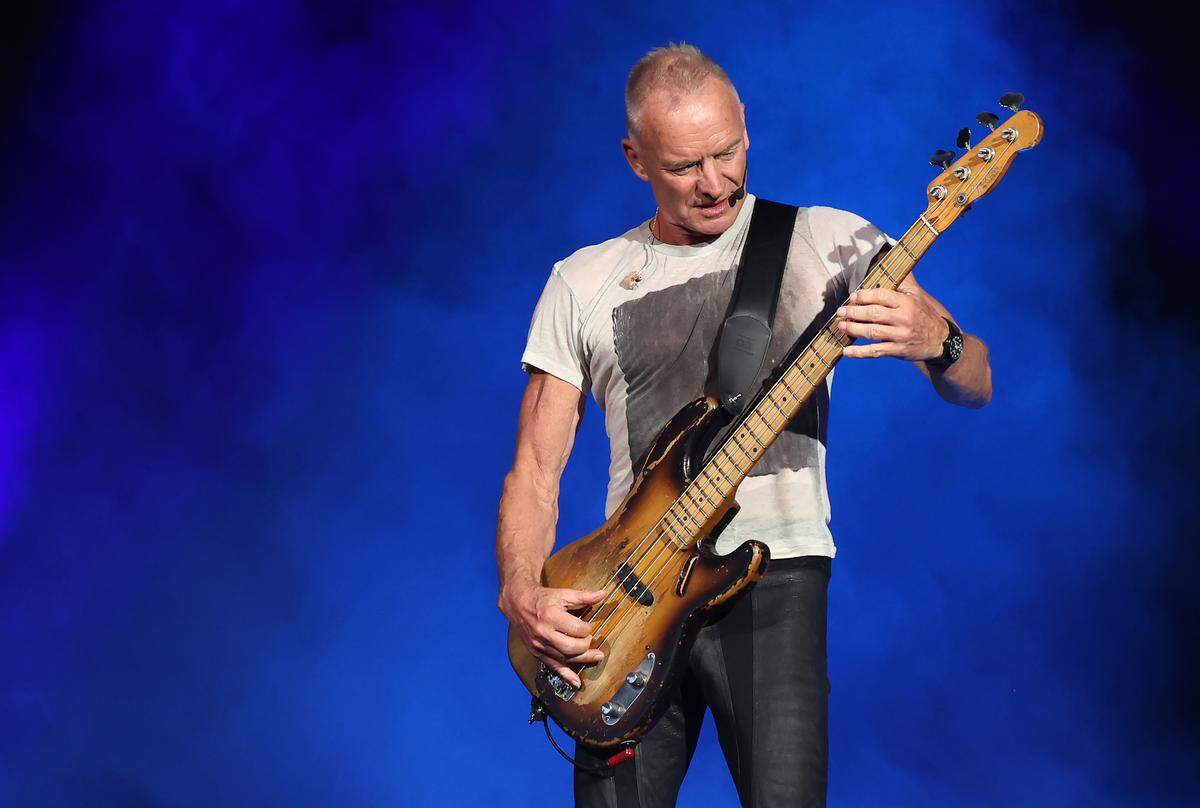 Sting performs during his “Sting 3.0” tour at Truliant Amphitheater in Charlotte on Monday night.