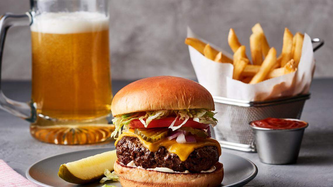 Village Tavern is known for steak, seafood and Tavern specialties including its cheeseburger, shown here.