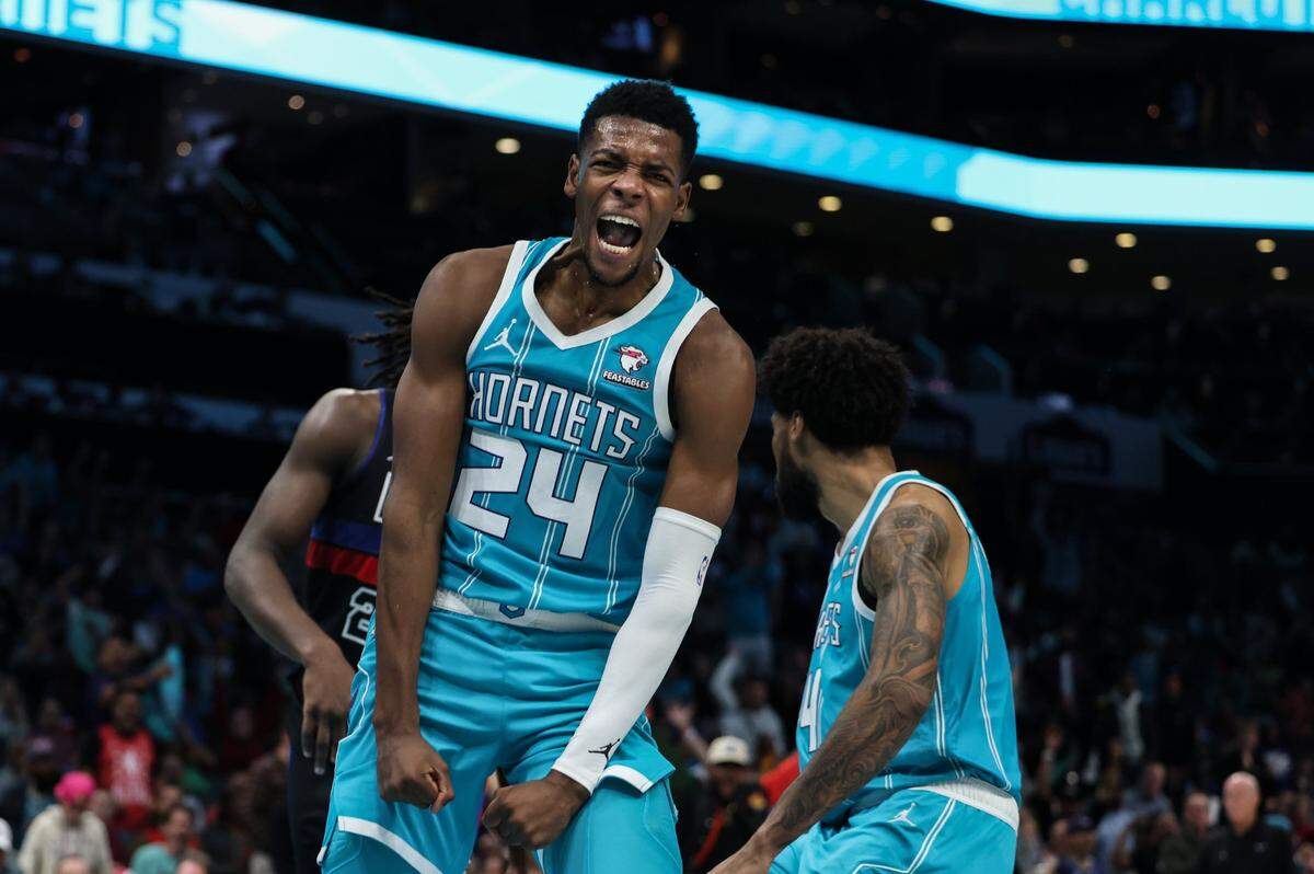 Charlotte Hornets rookie wing Brandon Miller reacts after scoring against the Detroit Pistons at the Spectrum Center in Charlotte, N.C., on Friday, October 27, 2023. Miller had 17 points in his second NBA game, but Detroit won, 111-99.