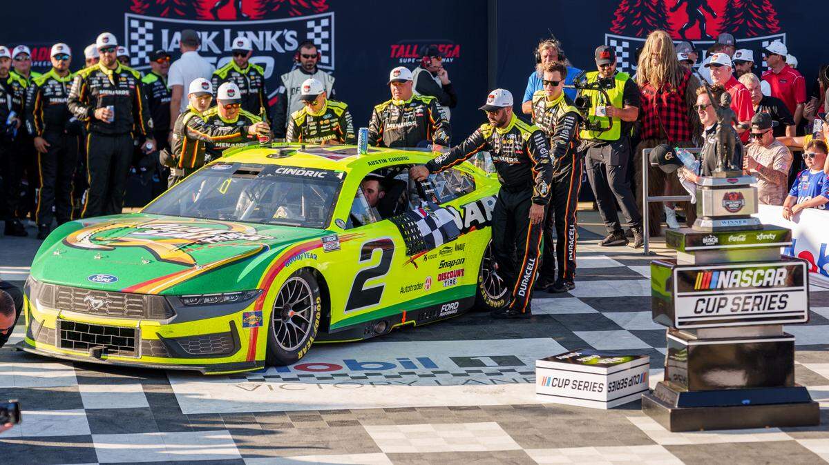 Apr 26, 2025; Talladega, Alabama, USA; NASCAR Cup Series driver Austin Cindric (2) drives into Victory Lane at Talladega Superspeedway.