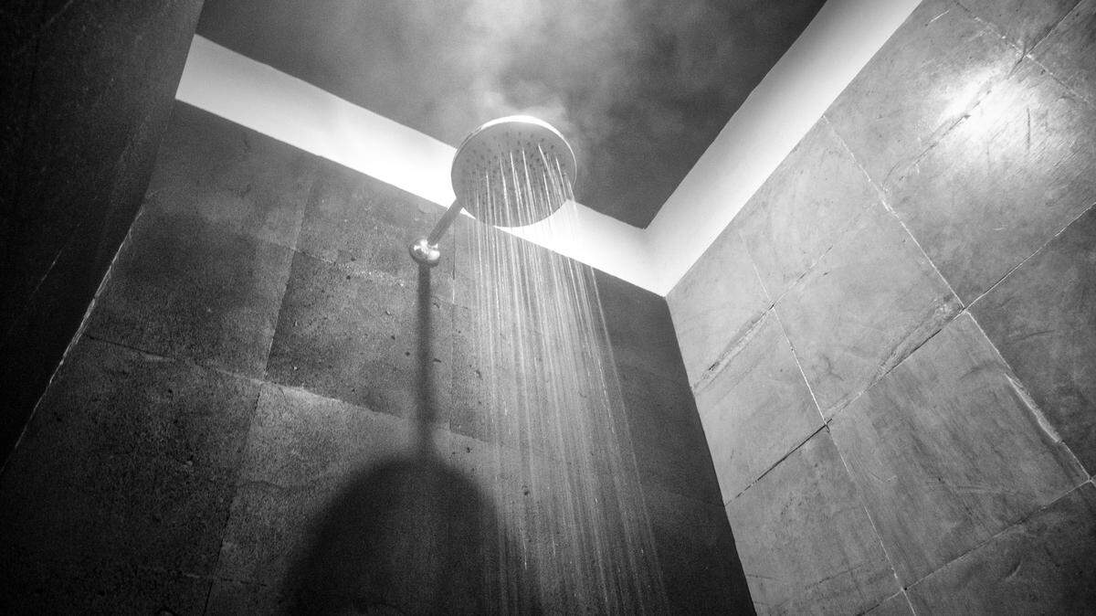 Steam hot water shower in the bathroom