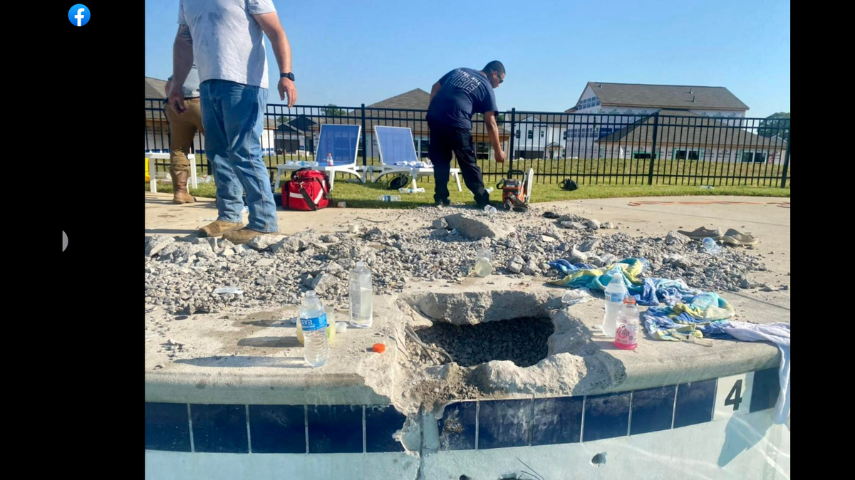 Crews broke through concrete to free the child from the pool, Tennessee officials said.