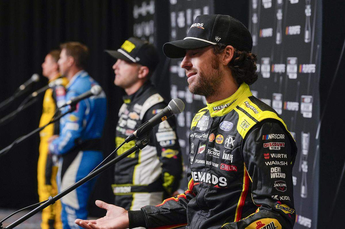 Aug 27, 2025; Charlotte, NC, USA; Wiliam Byron, Denny Hamlin, William Byron and Ryan Blaney answer questions from the media during NASCAR Cup Series Playoff Media Day at Charlotte Convention Center.
