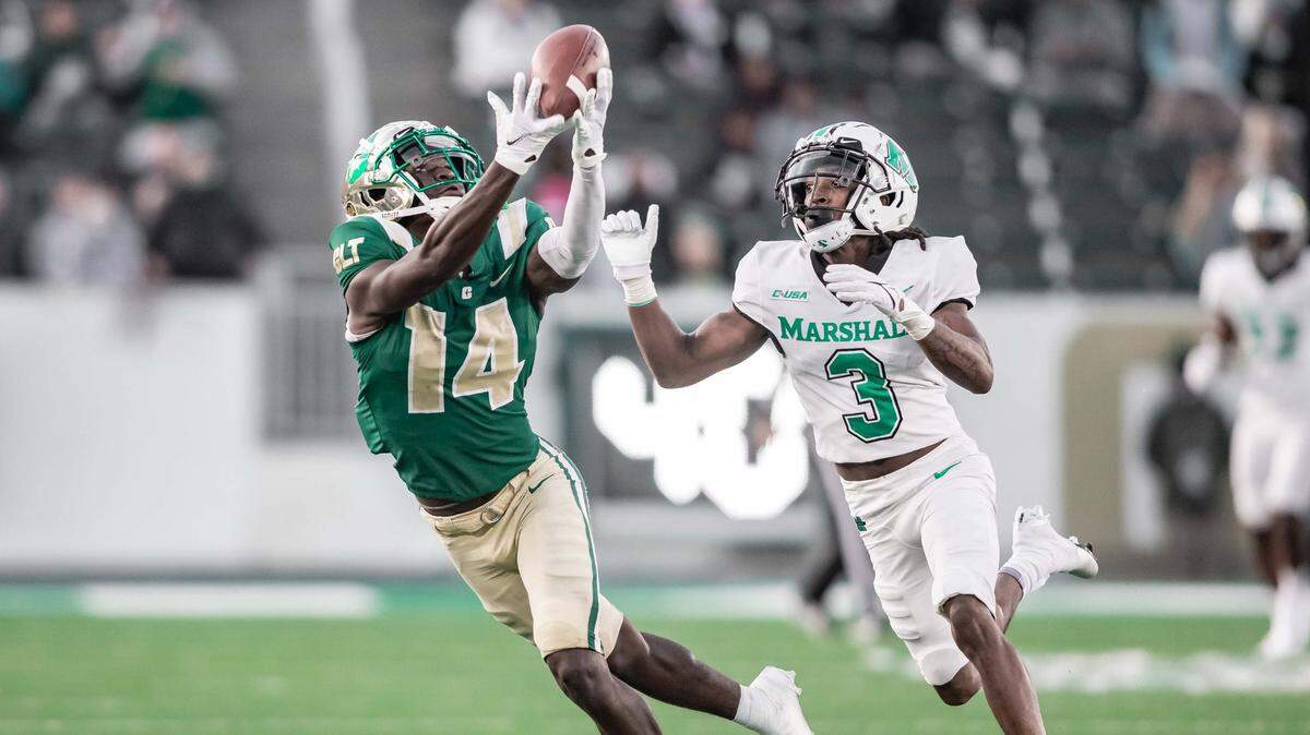 Charlotte’s Grant DuBose attempts the make a catch against Marshall last week. DuBose is on the brink of a 1,000-yard season.