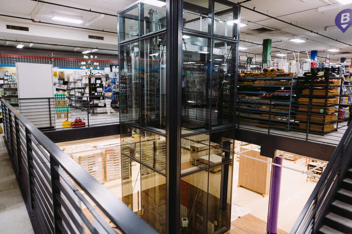 Blackhawk Hardware debuts its new elevator to connect the main level to the newly renovated basement floor.