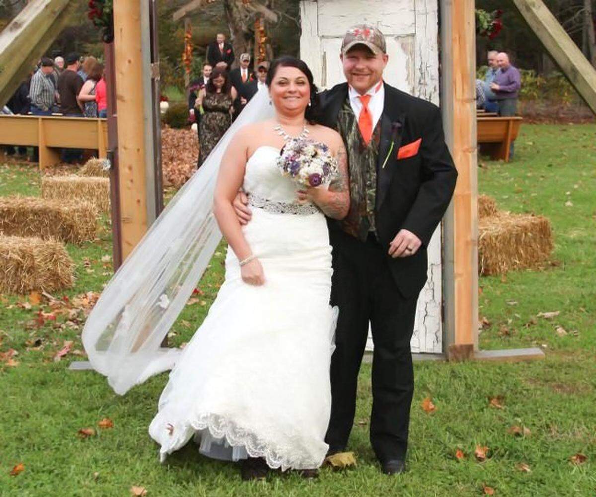 Melissa Guinn and her husband Jamie on their wedding day in Roan Mountain, Tenn.