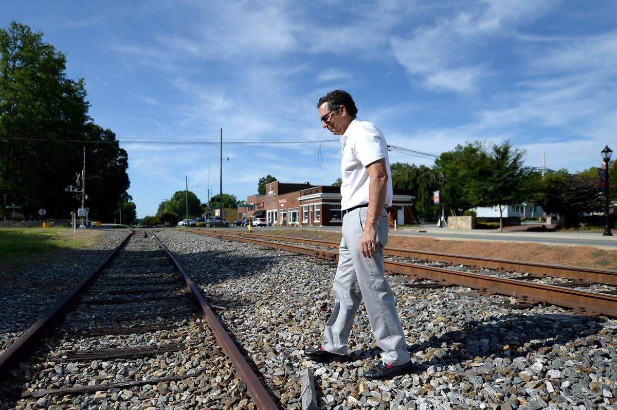 Huntersville Mayor John Aneralla is questioning the validity of Mecklenburg County’s mask mandate, slated to take effect next week as coronavirus cases once again surge around Charlotte.