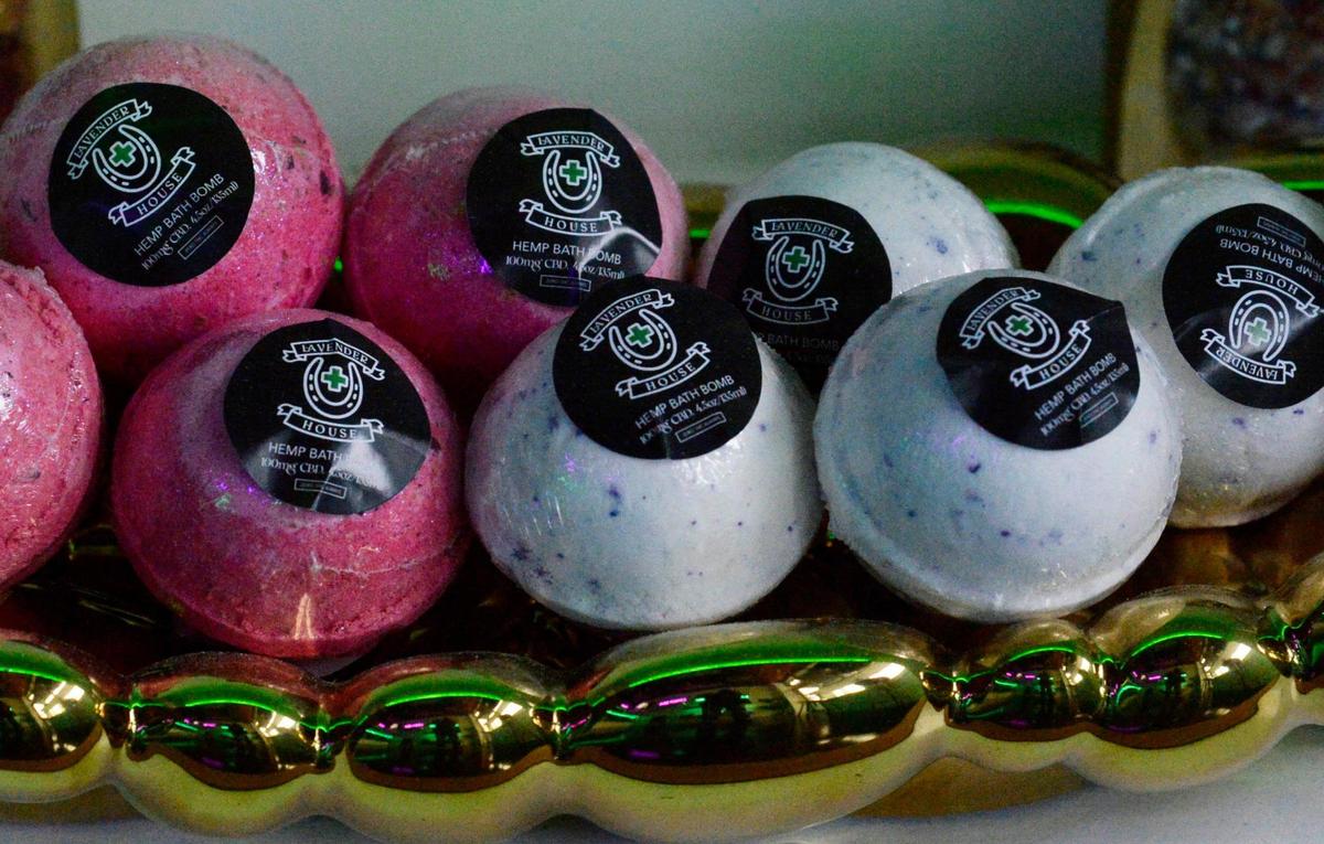 A row of Lavender House-branded hemp bath bombs at the dispensary in Charlotte.