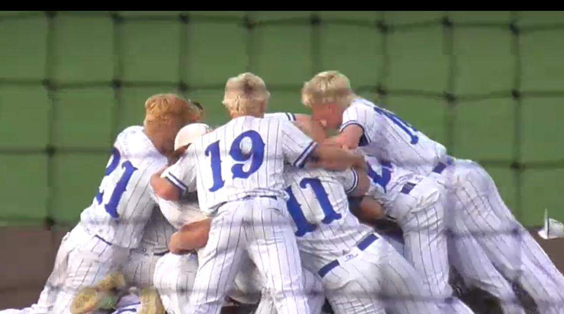Players from North Lincoln celebrate after beating Rose High School in the NCHSAA 3A state baseball championship Saturday