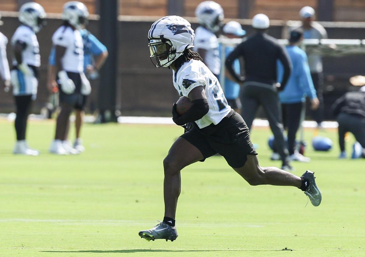 Panthers cornerback Chau Smith-Wade runs with the ball during a drill at training camp in Charlotte, NC on Wednesday, July 24, 2025.