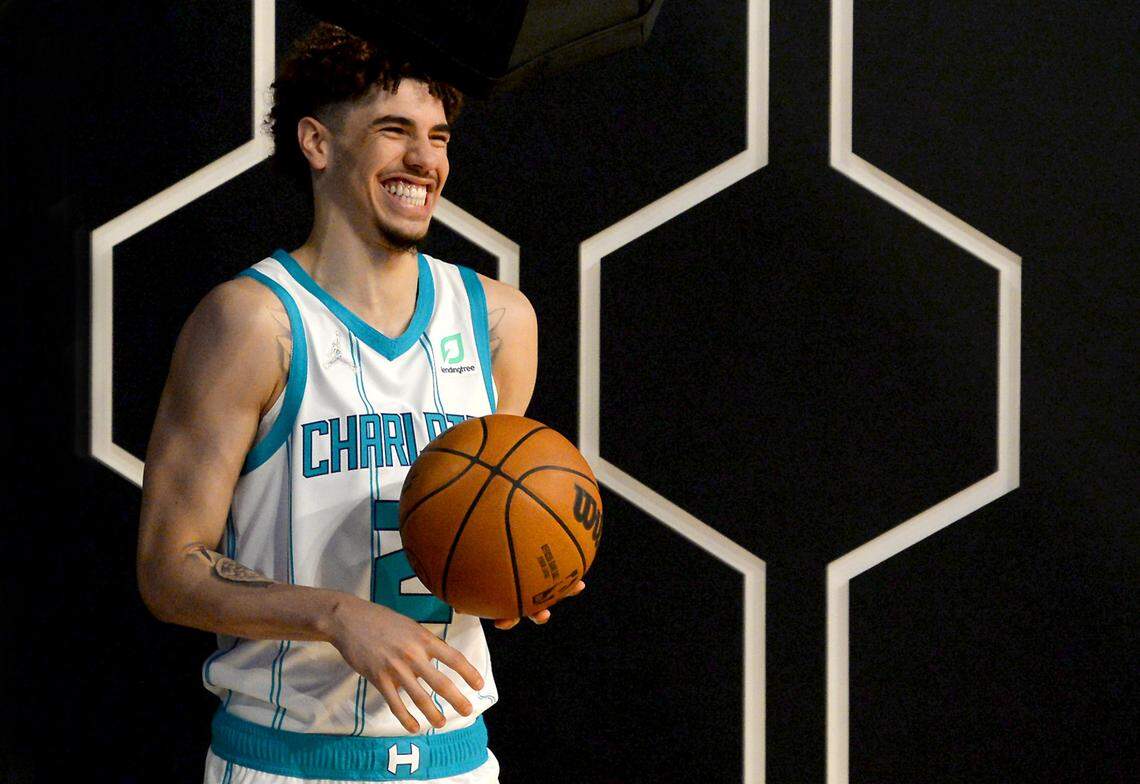 Charlotte Hornets guard LaMelo Ball laughs at a teammate during a photo session Monday. Ball averaged 15.7 points, 5.9 rebounds and 6.1 assists in his first NBA season.