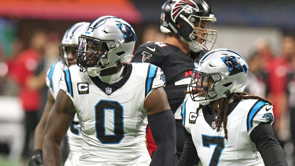 Brian Burns (0) celebrates a strip-sack in September. Burns had an off year by his standards in 2023, but still led the Panthers in sacks.