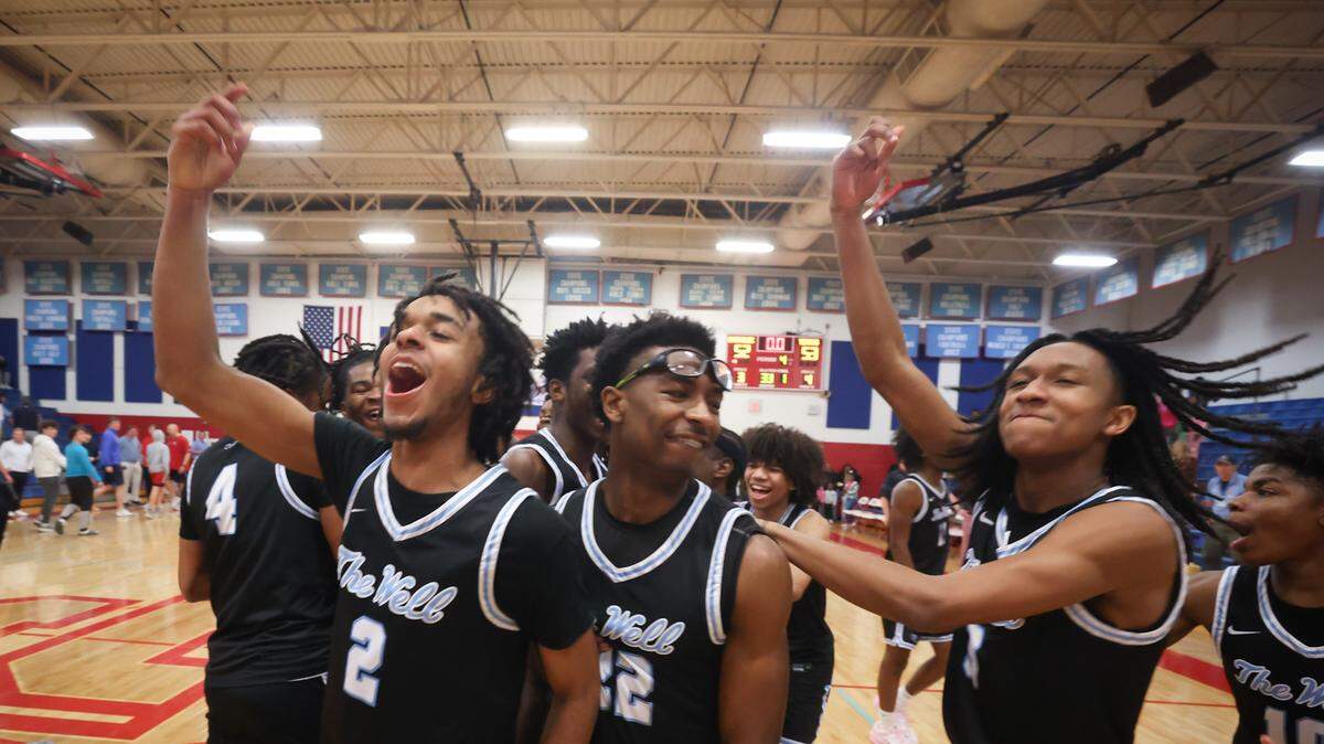 The Hopewell Titans celebrate after upsetting Southwestern 4A co-champion Charlotte Catholic in the first round of the NCHSAA 4A playoffs on Tuesday, Feb. 25, 2025.