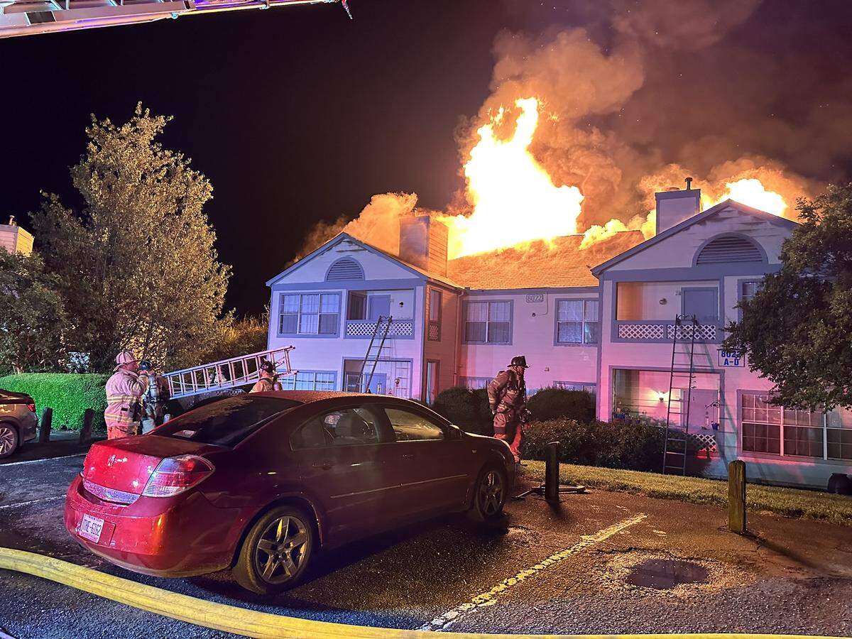 Firefighters respond to a two-alarm fire at an east Charlotte apartment building early Sunday, June 4, 2023.