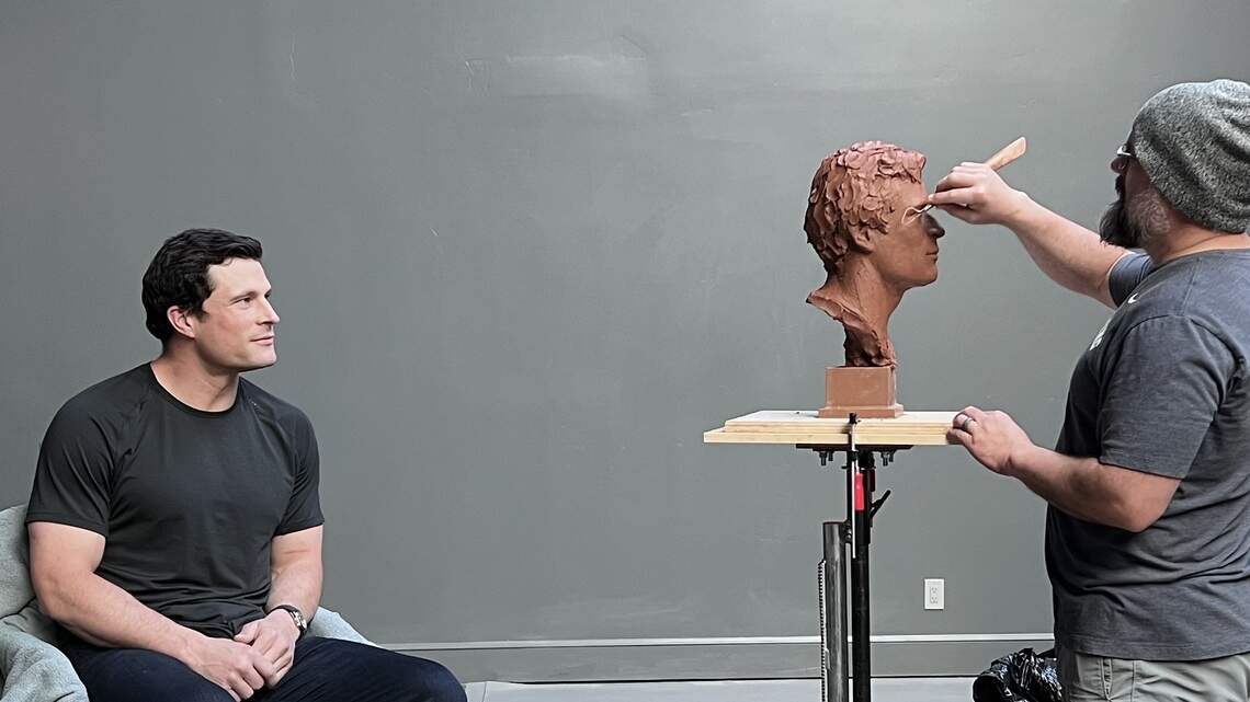 Sculpting Lu-u-u-ke: Behind the scenes as Kuechly strikes pose for hall of fame