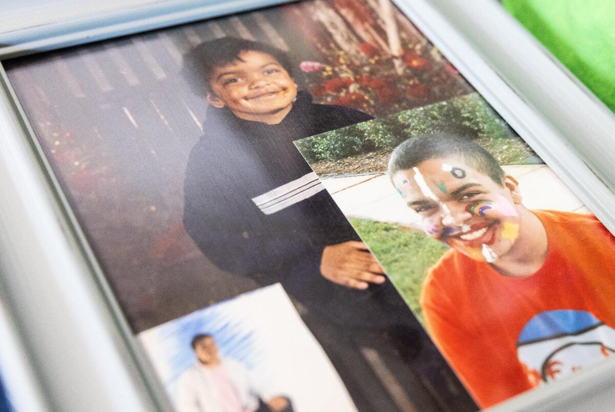 A picture frame with photos of Erik Ramsey in Troutman, N.C., in February. Ramsey committed suicide in a North Carolina prison last year. He was in isolation and had a history of mental health issues.