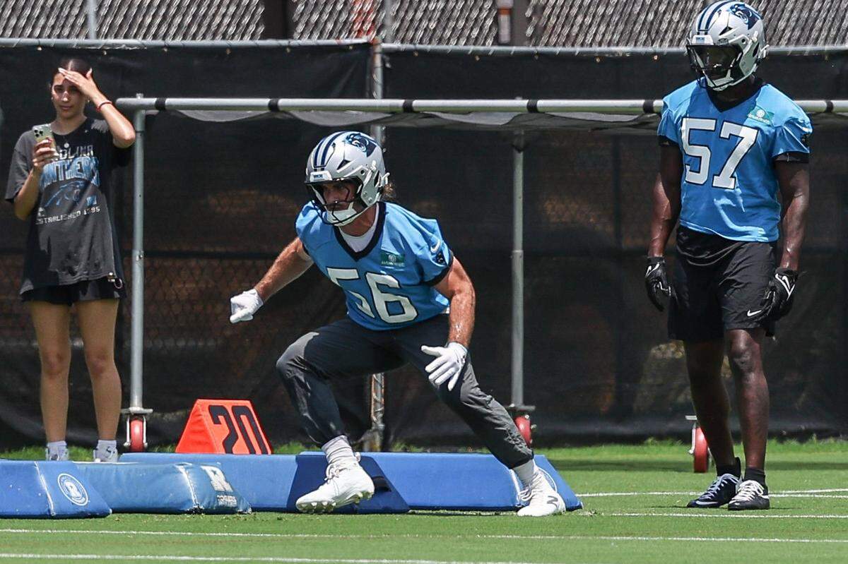 Panthers linebacker Christian Rozeboom, center, runs through a drill during the second day of minicamp in Charlotte, NC on Wednesday, June 11, 2025.