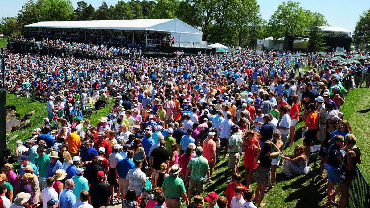 Fans crowd around the 18th green during the Wells Fargo Championship at Quail Hollow Club in Charlotte. The Presidents Cup will be held at Quail Hollow from Sept. 20-25.