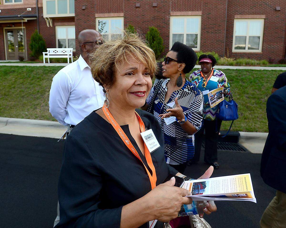 Charlotte City Council member, Vi Lyles, tours the Retreat at Renaissance at the former Boulevard Homes site in west Charlotte Tuesday, July 8, 2014. The Charlotte Minority Economic Diversity Initiative (CMEDI) launched their first CMEDI Citywide Innovation MBE Tour for Charlotte-area	participants. The tour highlighted several minority-owned companies that have benefitted from CMEDI's efforts to help such firms do business with major corporations.