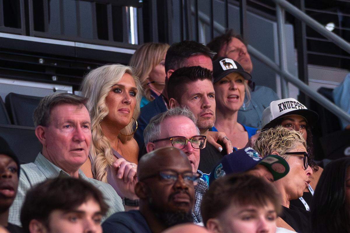 Chari and Kon Knueppel I (center of photo) watch a recent Charlotte Hornets game during their son’s rookie year. Both Knueppels played college basketball in Wisconsin and were inducted into the halls of fame for their respective schools. They had five boys in 5 1/2 years, with Kon II being the oldest.