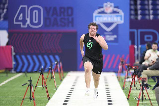 GettyImages-2265624669.jpg Kansas State center Sam Hecht participates in the 40-yard dash during the NFL combine on March 1, 2026, at Lucas Oil Stadium in Indianapolis.