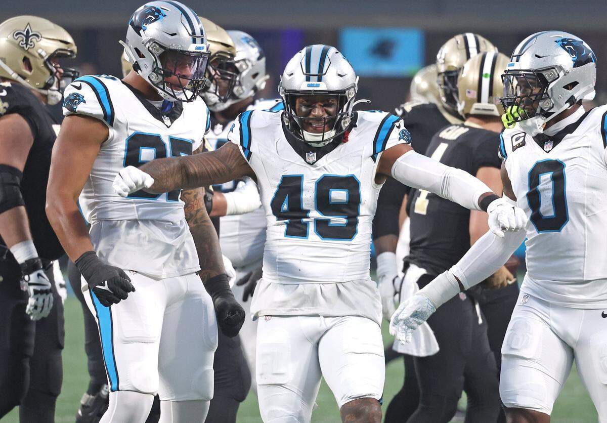 Carolina Panthers linebacker Frankie Luvu (49) celebrates a sack in September 2023. The Panthers will try hard to keep Luvu in the 2024 offseason, but he will be an unrestricted free agent.