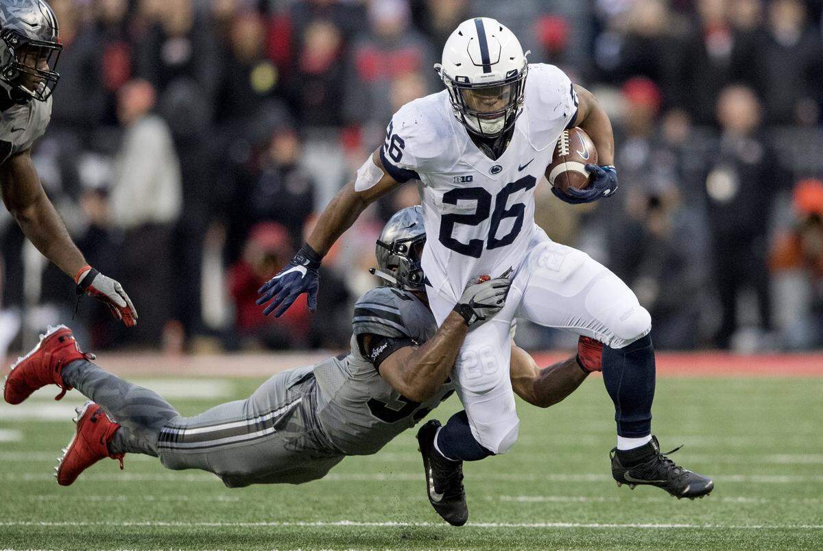 Saquon Barkley (26) was known for his powerful running style while playing in college at Penn State.
