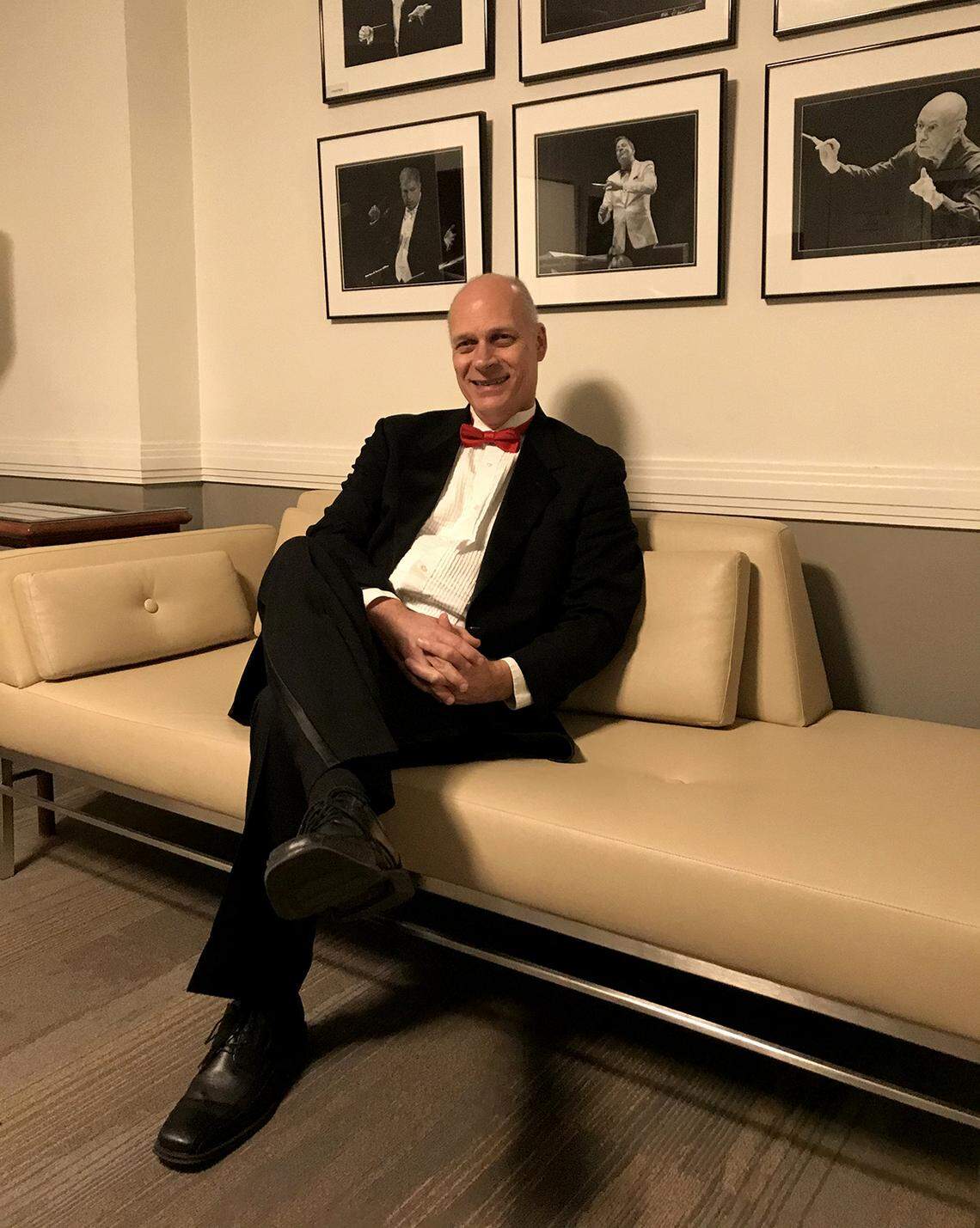 Ernest Pereira, music director and conductor of Youth Orchestras of Charlotte, sits in a dressing room at the Kennedy Center.