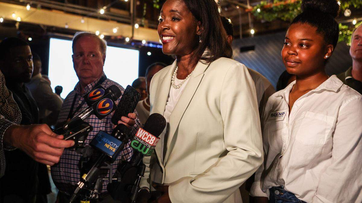 Charlotte  City Council District 6 candidate Stephanie Hand, center, speaks with media during an election watch party at Heist Brewery on Tuesday, July 26, 2022 in Charlotte, NC. 