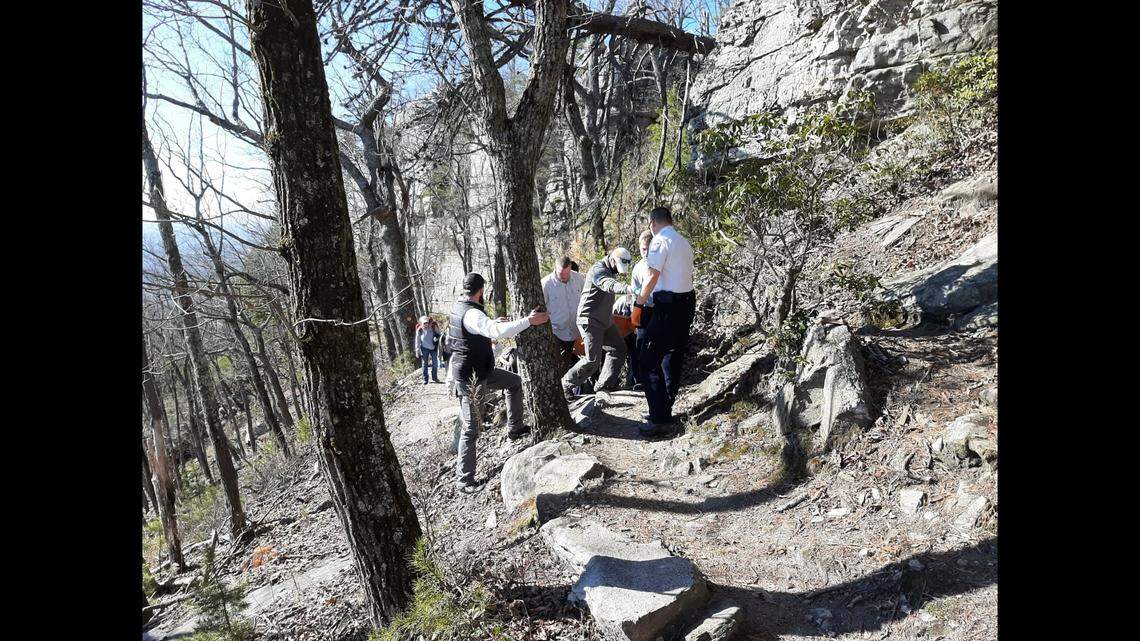 A hiker from the Charlotte areas was in critical condition Sunday after falling more than 50 feet down a cliff at Pilot Mountain State Park.
