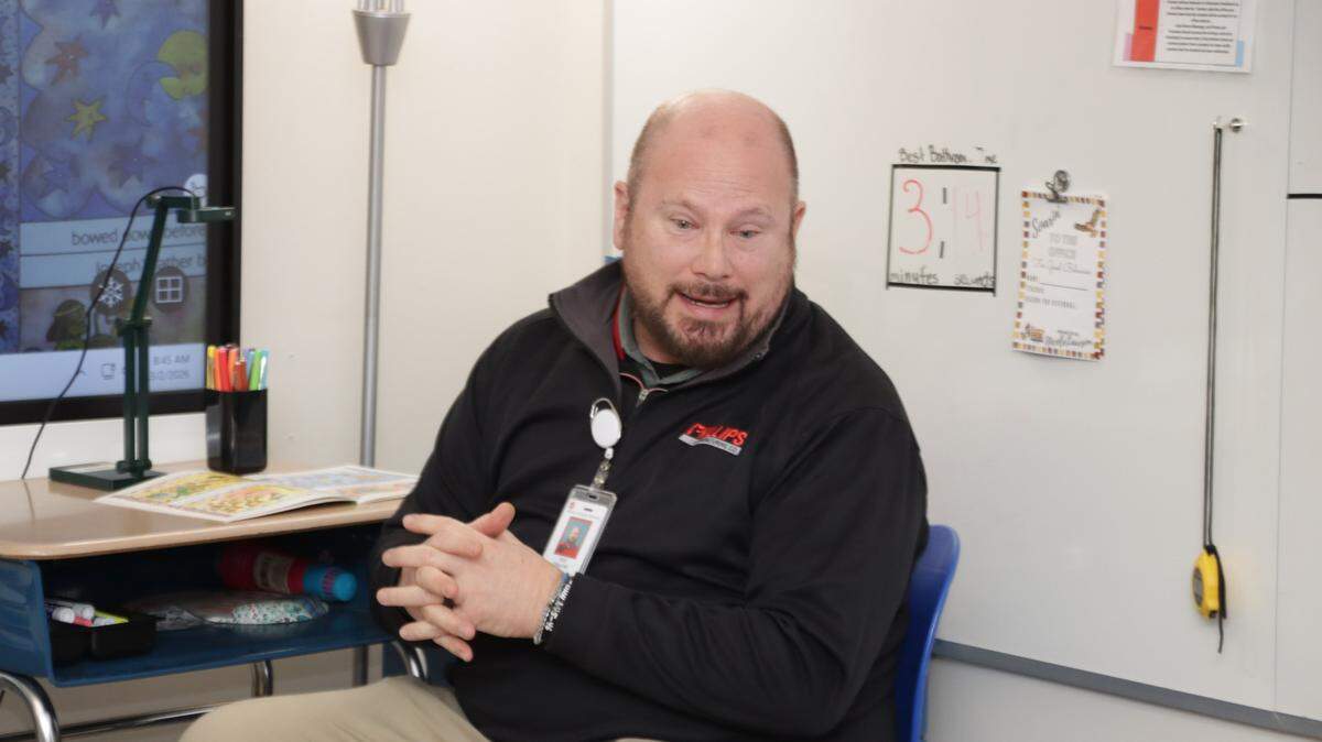 Tod Kinlaw, who represents the South Pointe Township on the Gaston County Schools board, is facing calls to resign after he reportedly shared an anti-Islamic Facebook post. He’s pictured here in a photo posted by Gaston County Schools in early March reading to students.