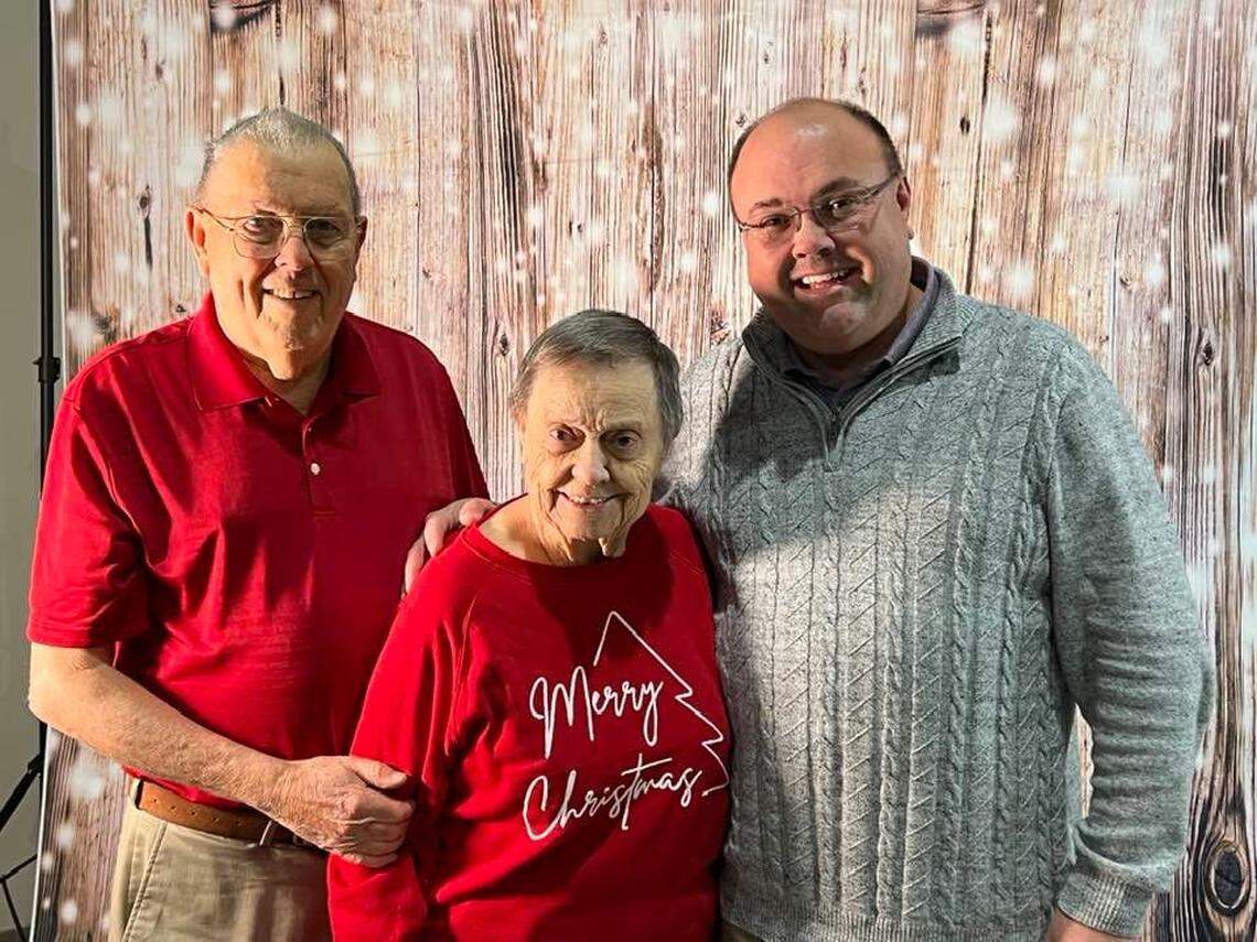 Josh Pettit, right, with her parents Bob and Betty at West Church in Mooresville last Christmas.