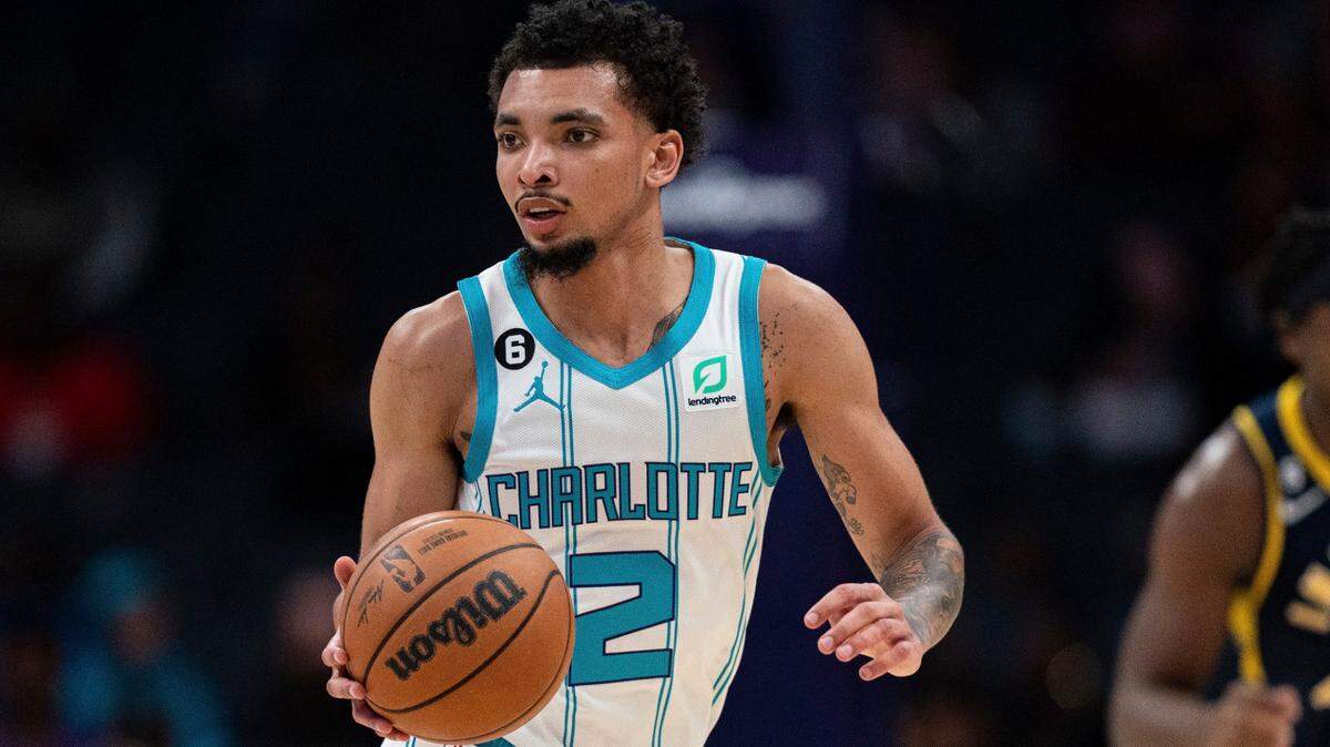 Charlotte Hornets guard James Bouknight was arrested and hit with a DWI charge after he was found sleeping in his car in an uptown parking deck with a gun.