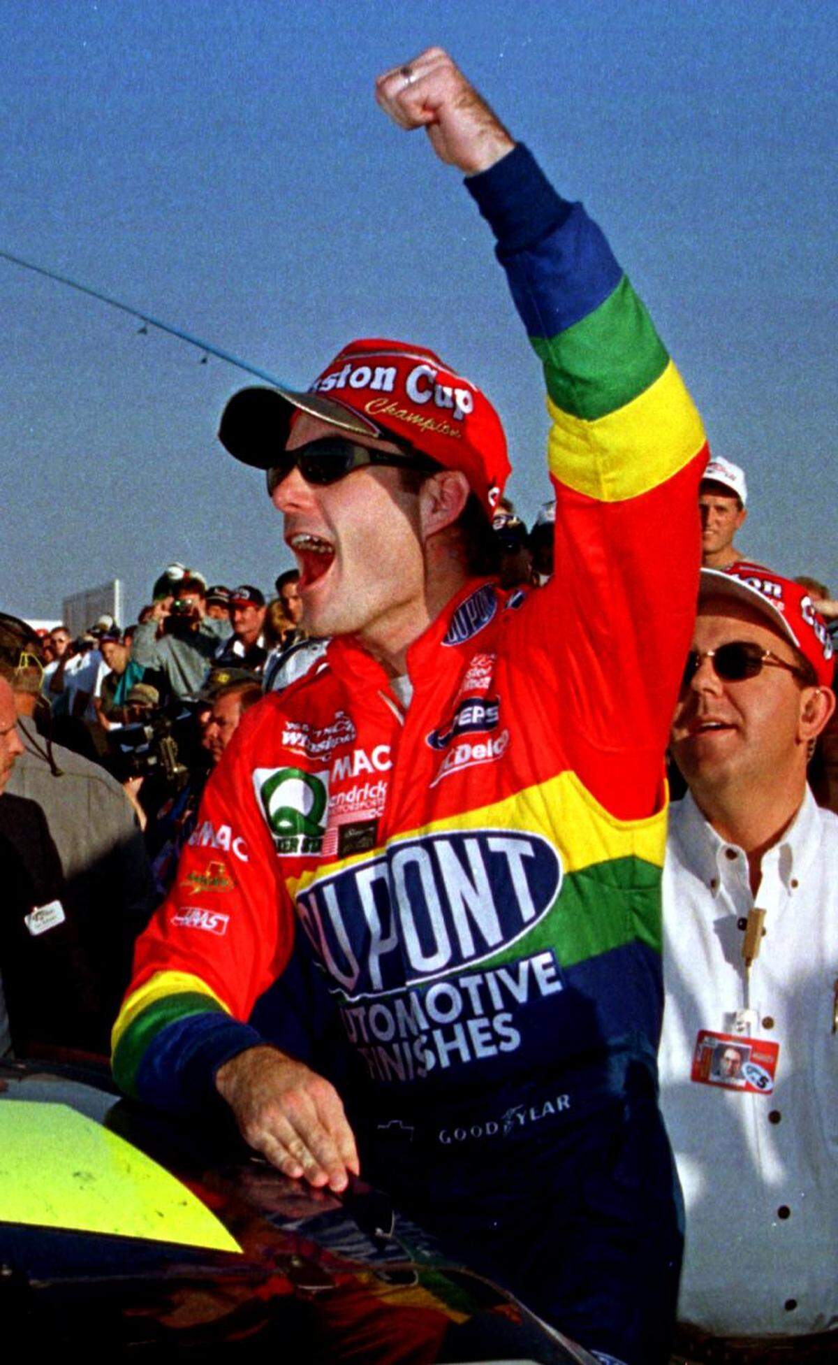 Gordon celebrating his third Cup Series championship in 1998 after winning the ACDelco 400 at Rockingham Speedway.