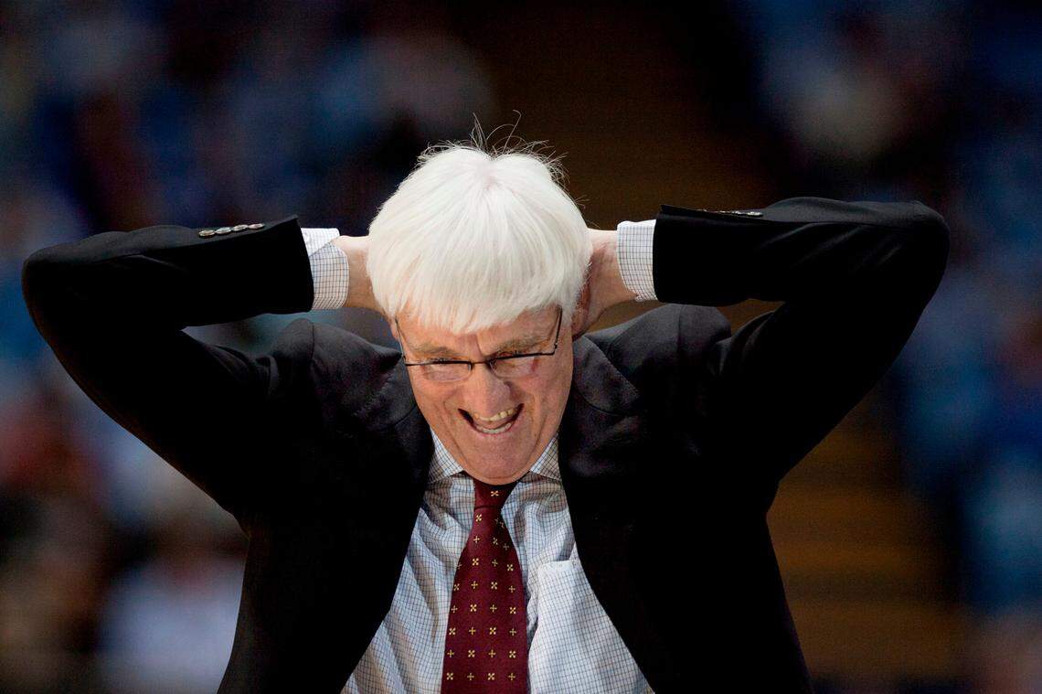 College of Charleston head coach Bobby Cremins reacts to a turnover by his team. Cremins’ mop of white hair started changing color in his early 30s and “I never touched it since then,” he said.