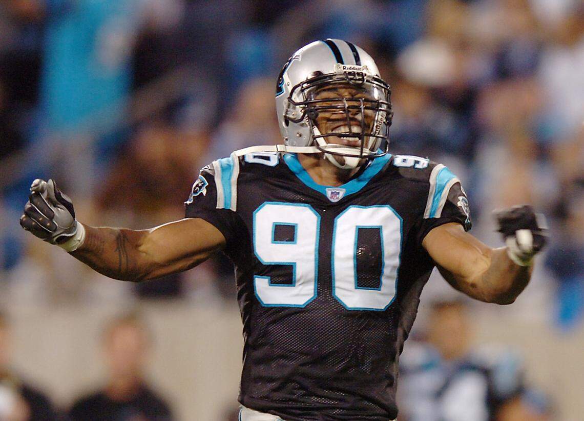Carolina defensive end Julius Peppers (90) celebrates his 50th career sack during game action against the Tampa Bay Buccaneers at Bank of America Stadium in Charlotte, North Carolina, Monday, November 13, 2006. (Christopher A. Record/Charlotte Observer/MCT)