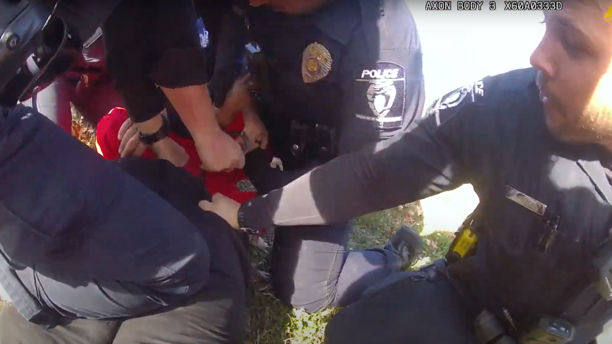 Charlotte-Mecklenburg Police Department officers hold down Christina Pierre as an officer in the back strikes her 17 times in the back of her leg with “compliance strikes.” Following this incident, Police Chief Johnny Jennings announced a new citizen committee to review the department’s policies.