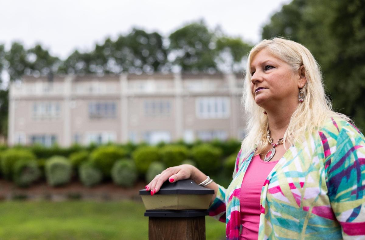 Sherry Loeffler poses for a portrait near her townhouse at Lake Wylie. She became mired in a lengthy court fight after her HOA hit her with nearly $12,000 in fines - over windows that she says they approved. “I want other homeowners to know this can happen to them,” she said. “And if they don’t have the money to fight it, they could lose their homes.”