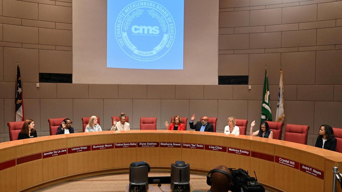 The new contracts for 11 executives come as Charlotte-Mecklenburg Schools moves away from its model that splits up schools by geography.