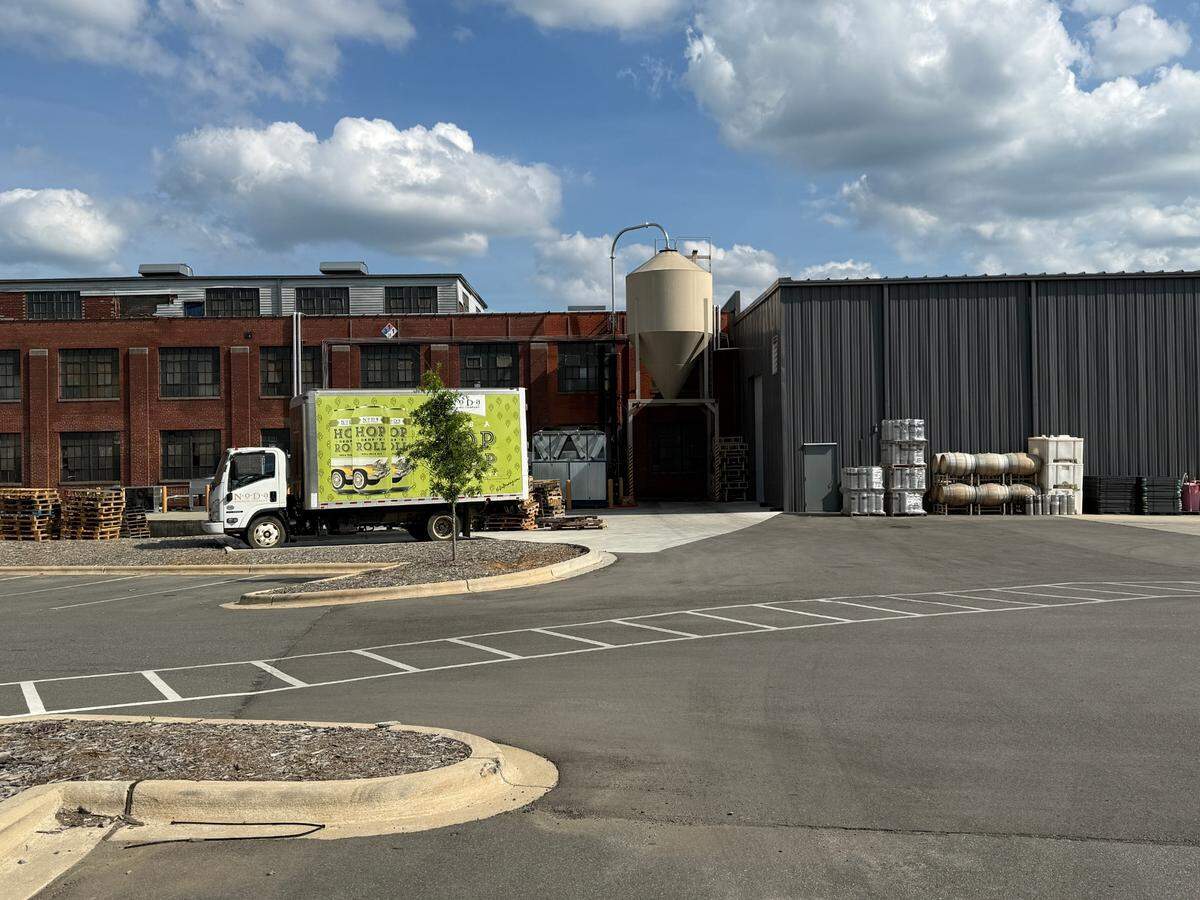 For now, NoDa Brewing is having to absorb the costs of rising prices of the domestic aluminum it uses for beer cans.