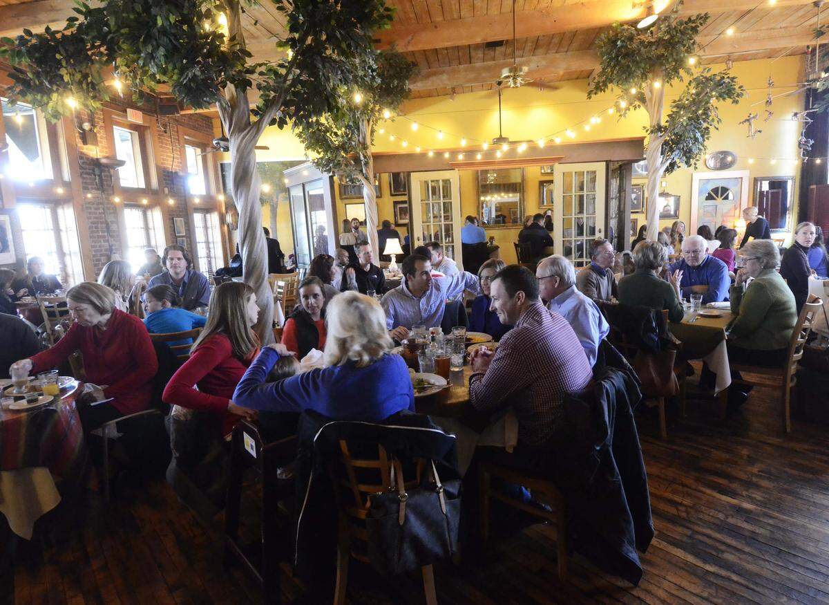 Patrons at the Pewter Rose during the 11:30AM Sunday brunch. Pewter Rose restaurant, located at 1820 South Blvd, held its last Sunday brunch on Sunday, Jan. 20,2013. The restaurant owners decided to close the restaurant after 25 years.