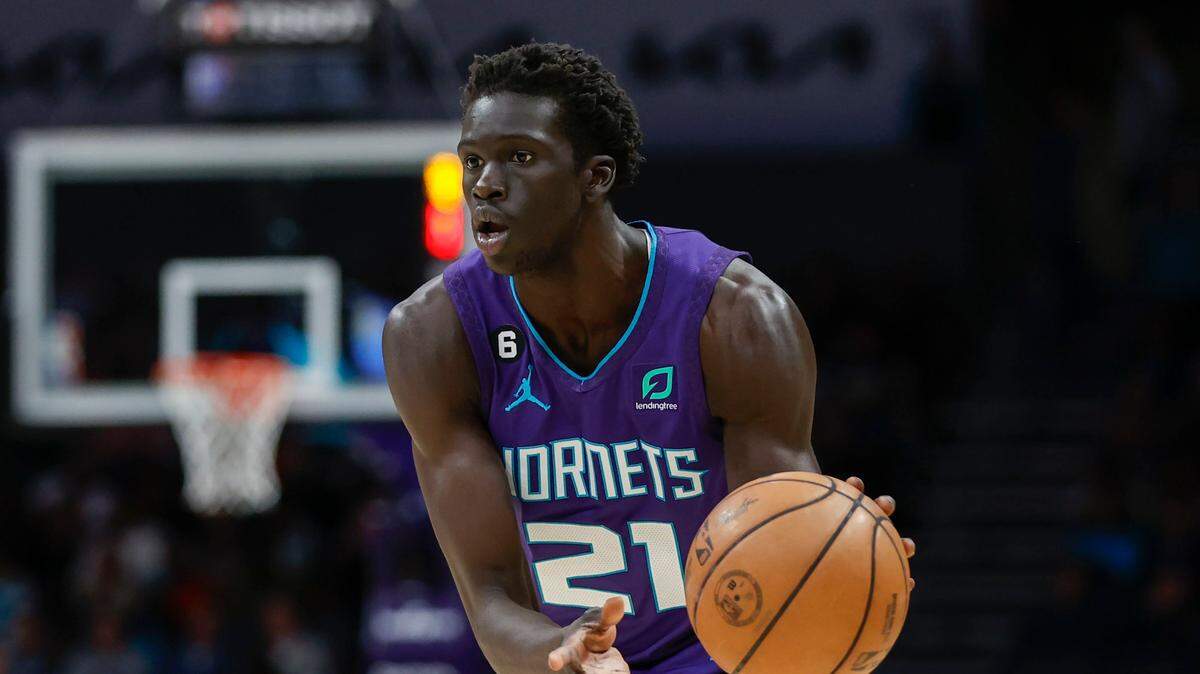Charlotte Hornets forward JT Thor passes against the Denver Nuggets during the first half of an NBA basketball game in Charlotte, N.C., Saturday, Feb. 11, 2023. Denver won 119-105. (AP Photo/Nell Redmond)
