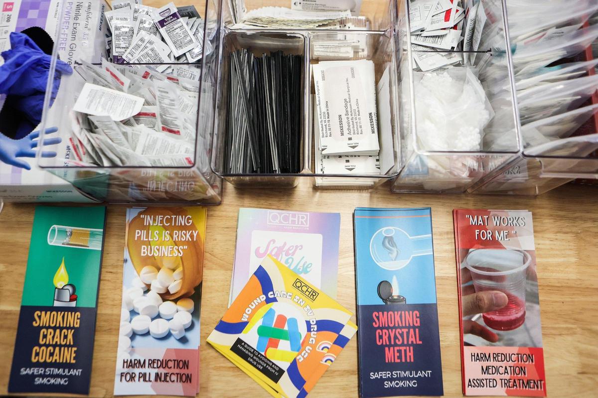 Informational pamphlets and items for care packages are available for those seeking assistance at Queen City Harm Reduction on Thursday, November 17, 2022. 